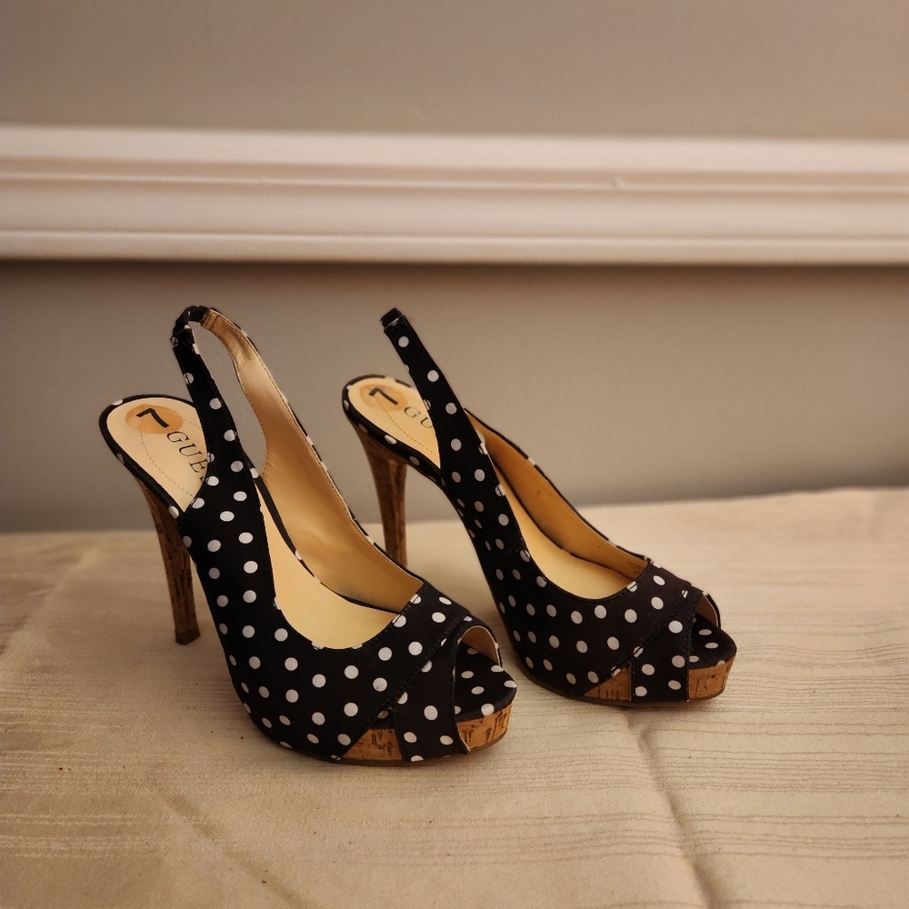 Guess women shoes, size 7.   Color black and white fabric.
